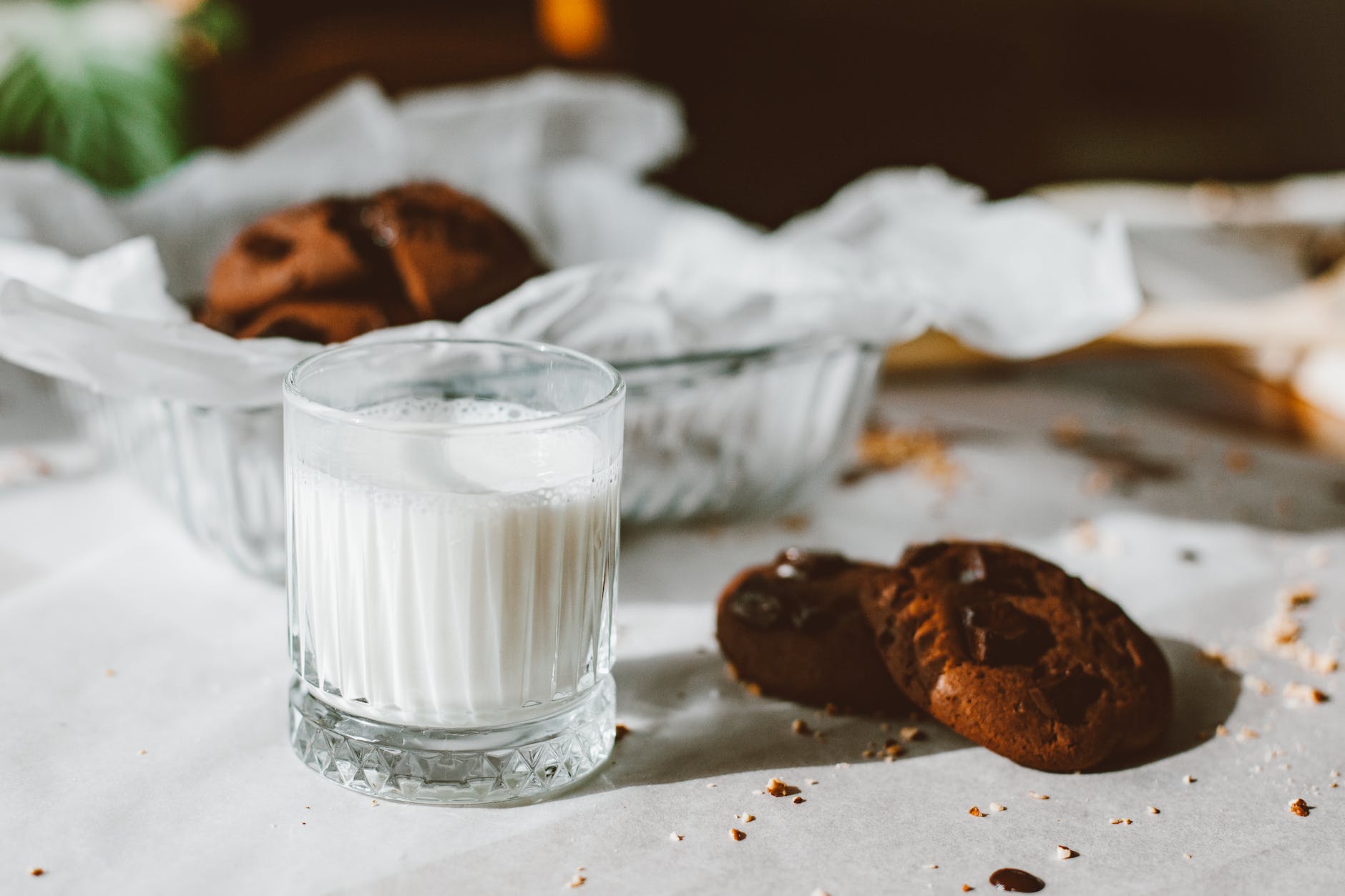 a glass of milk and cookies