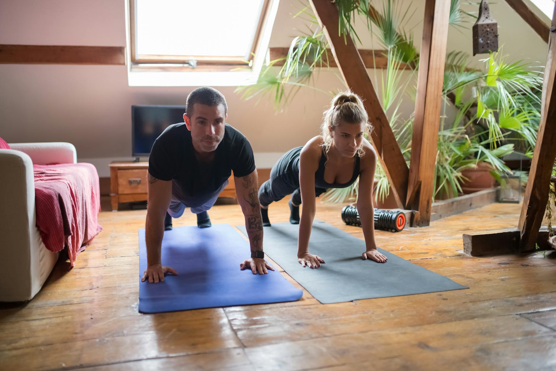 a man and woman working out together